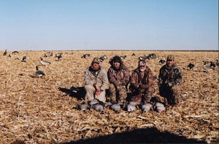 Doug, Scott, Dave, and Jason put it on em' in the corn.