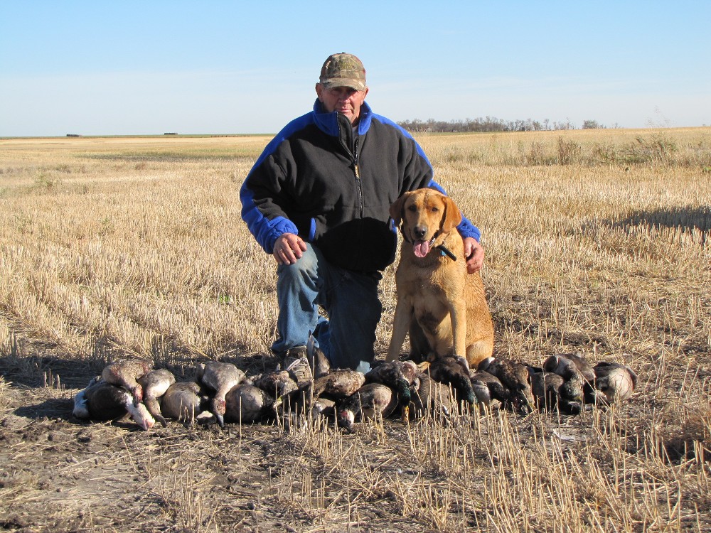 Dad and Lou after a good hunt.